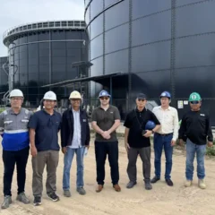 Landia Thailand Team with Client in centre in Front of GasMix Mixed Digester Tanks