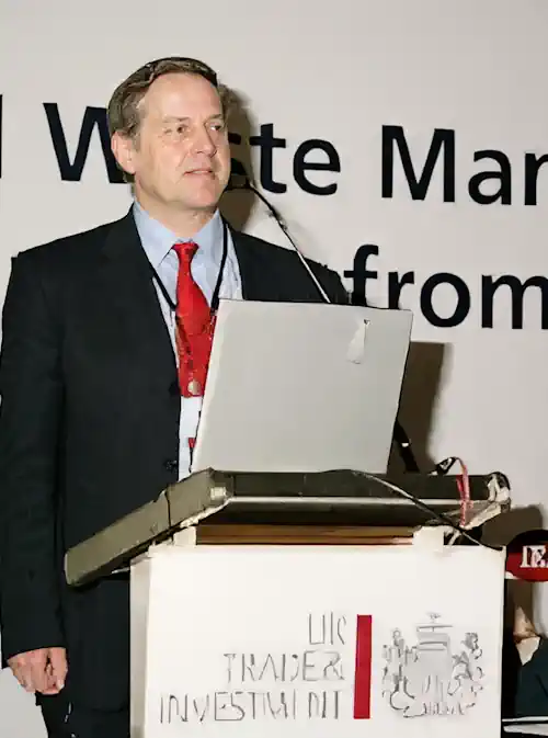 Steve Last on the podium speaking at a UK DTI Trade and Investment Event