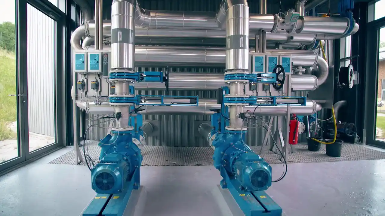 Image is a: YouTube thumbnail showing biogas heat exchangers.